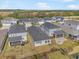 Community overview showcasing numerous homes with gray roofs at 5936 Golden Nettle Dr, Apollo Beach, FL 33572