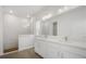 Double vanity bathroom with a walk-in shower at 5936 Golden Nettle Dr, Apollo Beach, FL 33572