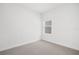 Spacious bedroom with neutral wall paint and carpet flooring at 5936 Golden Nettle Dr, Apollo Beach, FL 33572