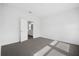 Bright bedroom with grey carpet and an ensuite bathroom at 5936 Golden Nettle Dr, Apollo Beach, FL 33572