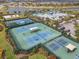 Aerial view showing tennis, pickleball, and basketball courts at 5936 Golden Nettle Dr, Apollo Beach, FL 33572