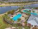 Resort-style pool with lap lanes, lounge area and water slide at 5936 Golden Nettle Dr, Apollo Beach, FL 33572