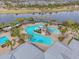 Aerial view of resort-style pool with a waterslide and lounge area at 5936 Golden Nettle Dr, Apollo Beach, FL 33572