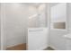 Modern shower with glass enclosure and light grey tile at 5936 Golden Nettle Dr, Apollo Beach, FL 33572