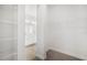 Large walk-in closet with wire shelving and bathroom access at 5936 Golden Nettle Dr, Apollo Beach, FL 33572