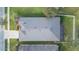 Overhead shot showing the home's roof, lawn, driveway, and proximity to neighborhood streets at 6722 Boulder Run Loop, Wesley Chapel, FL 33545