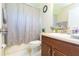 Well-lit bathroom with neutral color scheme and shower and tub combo at 6722 Boulder Run Loop, Wesley Chapel, FL 33545