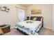 Cozy bedroom with carpeted floor, a double bed, a window with blind and neutral decor at 6722 Boulder Run Loop, Wesley Chapel, FL 33545