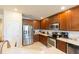 Well-equipped kitchen featuring stainless steel appliances and abundant cabinet space at 6722 Boulder Run Loop, Wesley Chapel, FL 33545