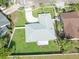 Aerial view showcasing the home's layout and yard at 734 Fortuna Dr, Brandon, FL 33511
