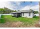 House with screened patio and spacious backyard at 734 Fortuna Dr, Brandon, FL 33511