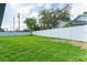 Spacious backyard with a large grassy area at 734 Fortuna Dr, Brandon, FL 33511