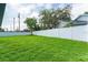 Spacious backyard with a large grassy area at 734 Fortuna Dr, Brandon, FL 33511