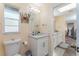 Clean bathroom with white vanity, quartz countertop, and view of a second sink at 734 Fortuna Dr, Brandon, FL 33511