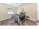 Bright bedroom with a comfortable bed and hardwood floors at 734 Fortuna Dr, Brandon, FL 33511
