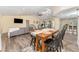 Dining area features a rustic table, chairs and hardwood floors at 734 Fortuna Dr, Brandon, FL 33511