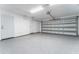 Spacious garage with epoxy flooring and storage at 734 Fortuna Dr, Brandon, FL 33511