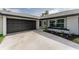 New garage door and clean concrete driveway at 734 Fortuna Dr, Brandon, FL 33511