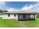 Newly renovated house exterior with screened patio at 734 Fortuna Dr, Brandon, FL 33511
