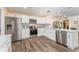 Modern kitchen with white cabinets, stainless steel appliances, and island at 734 Fortuna Dr, Brandon, FL 33511