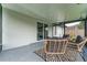 Relaxing screened patio with wicker furniture at 734 Fortuna Dr, Brandon, FL 33511