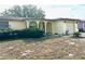 Single story house with a neatly kept front yard at 7614 Karen Dr, Port Richey, FL 34668