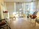 Sunroom with tiled floor and ample natural light at 7614 Karen Dr, Port Richey, FL 34668