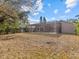 Large backyard with screened pool area at 805 Anchors Way, Tarpon Springs, FL 34689