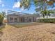 Spacious backyard with screened pool at 805 Anchors Way, Tarpon Springs, FL 34689