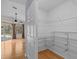 Walk-in closet with wire shelving and ample hanging space at 805 Anchors Way, Tarpon Springs, FL 34689