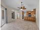 Bright dining area with tile floors and access to the kitchen at 805 Anchors Way, Tarpon Springs, FL 34689