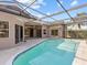 Screened pool and patio area at 805 Anchors Way, Tarpon Springs, FL 34689