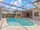 Relaxing screened pool area with patio at 805 Anchors Way, Tarpon Springs, FL 34689
