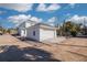 View of new construction garage with house in the background at 870 29Th N Ave, St Petersburg, FL 33704