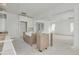 Bright kitchen with a custom wood island and modern white cabinetry being installed at 870 29Th N Ave, St Petersburg, FL 33704