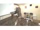 Updated kitchen features granite countertops, stainless steel appliances, and a cozy dining area with decor at 100 Bluff View Dr # 401A, Belleair Bluffs, FL 33770