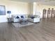 Spacious lobby with comfortable seating and modern flooring at 100 Bluff View Dr # 401A, Belleair Bluffs, FL 33770