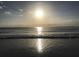 Bright sunset reflecting on ocean at 100 Bluff View Dr # 401A, Belleair Bluffs, FL 33770