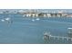 Stunning water view featuring a private dock and boats sailing in the distance at 100 Bluff View Dr # 401A, Belleair Bluffs, FL 33770