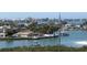 Scenic water view showcasing nearby homes, docks, and boats sailing on the bay at 100 Bluff View Dr # 401A, Belleair Bluffs, FL 33770