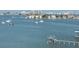 Beautiful water view featuring a private dock and boats sailing in the distance at 100 Bluff View Dr # 401A, Belleair Bluffs, FL 33770