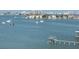 Stunning water view featuring a private dock and boats sailing in the distance at 100 Bluff View Dr # 401A, Belleair Bluffs, FL 33770