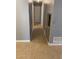 Clean hallway with tile flooring and access to other rooms at 1001 E 26Th Ave, Tampa, FL 33605