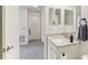 Bathroom with stylish sink, cabinet, and modern fixtures at 10144 Arbor Run Dr # 107, Tampa, FL 33647