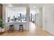 Modern kitchen view with breakfast bar, white cabinetry, stainless steel appliances, and open layout at 10144 Arbor Run Dr # 107, Tampa, FL 33647
