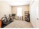 Bedroom with window, carpet and ample closet space at 10428 Rivercrest Dr, Riverview, FL 33578