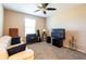 Bright Gathering room with comfortable seating and large TV at 10428 Rivercrest Dr, Riverview, FL 33578