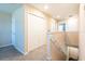 Upstairs hallway with carpet and access to bedrooms at 10428 Rivercrest Dr, Riverview, FL 33578