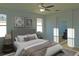 Spacious bedroom with neutral decor and ensuite bathroom access at 11016 Holly Cone Dr, Riverview, FL 33569