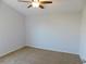 Spacious bedroom with ceiling fan and neutral walls at 11016 Holly Cone Dr, Riverview, FL 33569